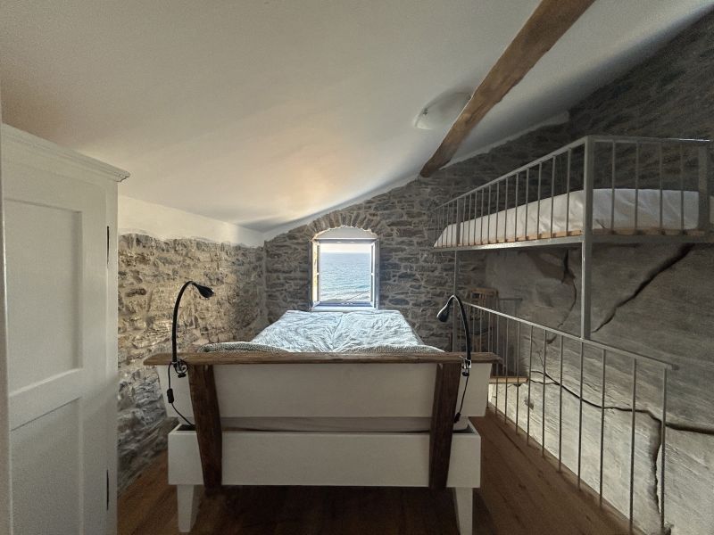 bedroom with seaviwv in holiday apartment kafenio in ikaria