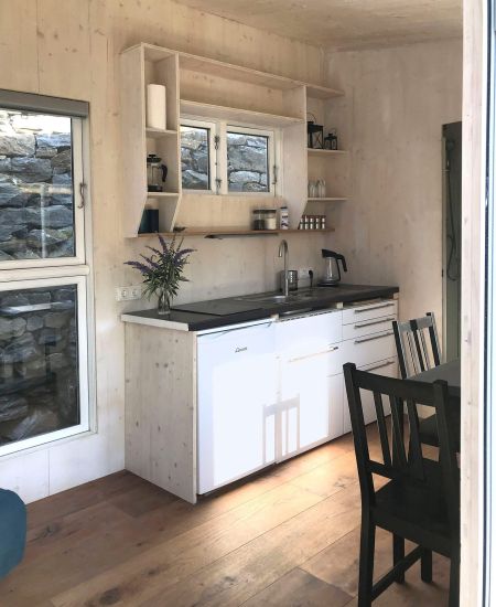 TinyHouse living romm with kitchen